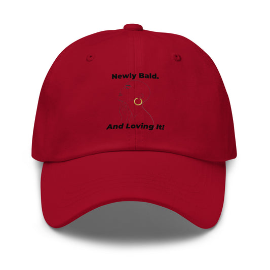 Woman's "Newly Bald & Loving It!" embroidered dad hat for alopecia awareness and bald beauty confidence.